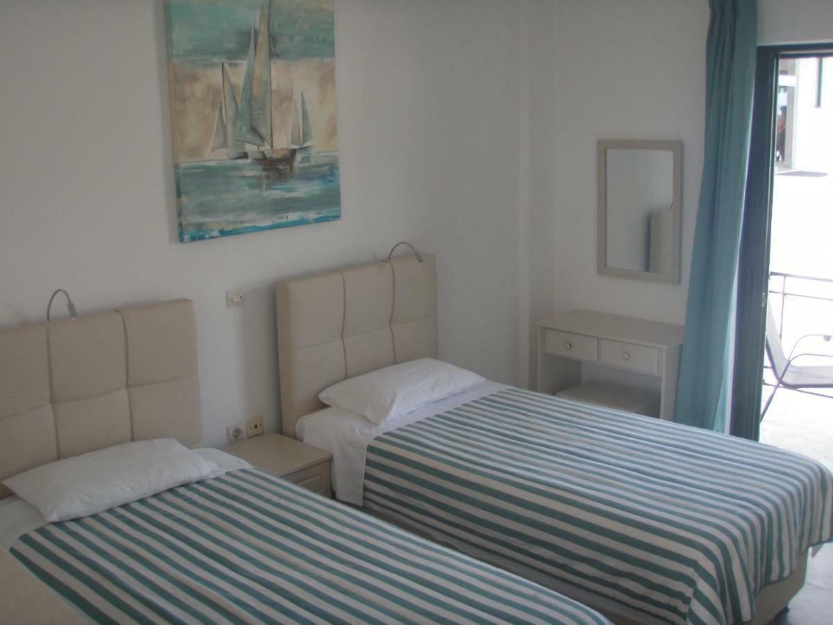 Umbrella Beach Apartments Кавос Экстерьер фото