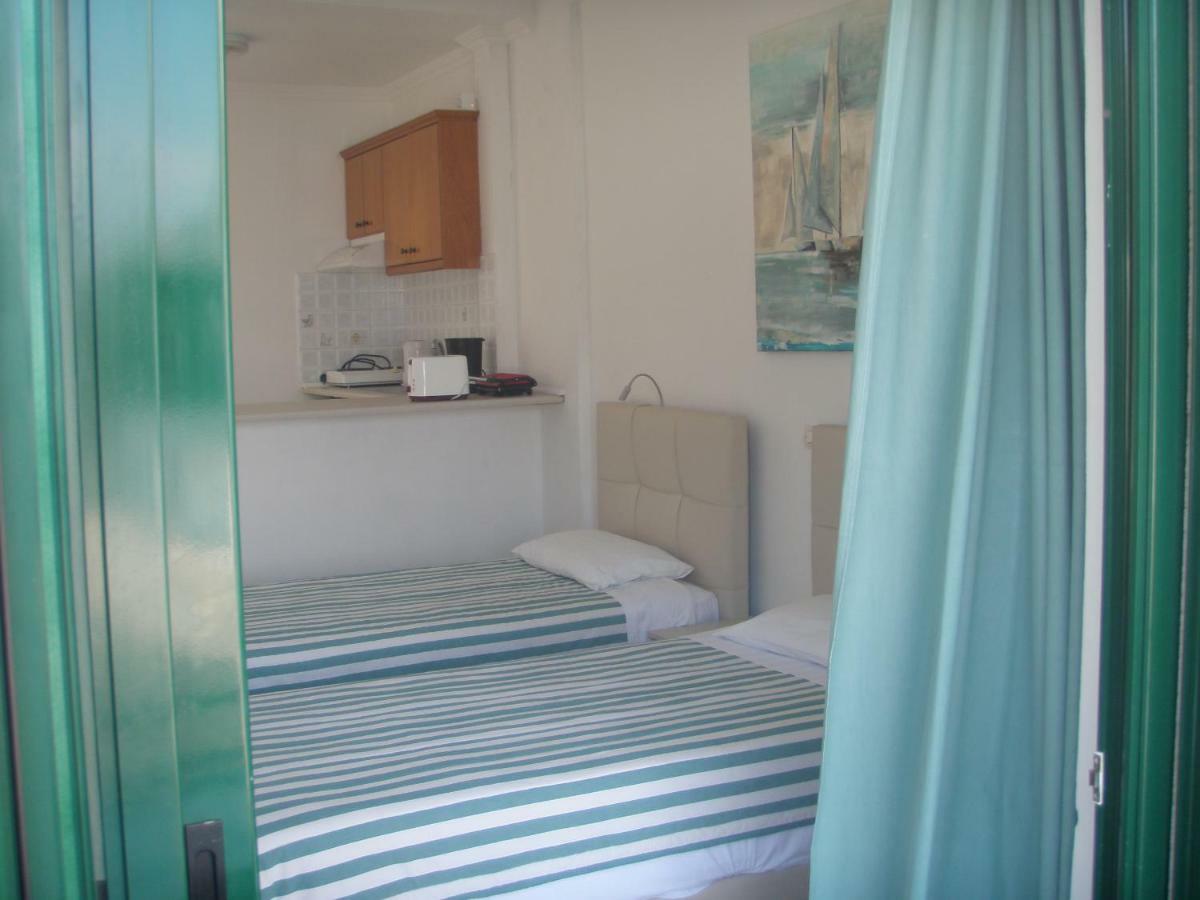 Umbrella Beach Apartments Кавос Экстерьер фото