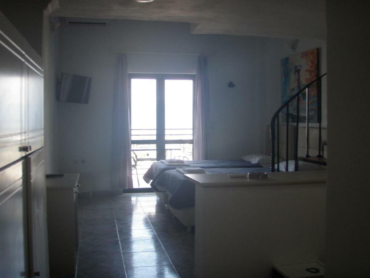 Umbrella Beach Apartments Кавос Экстерьер фото