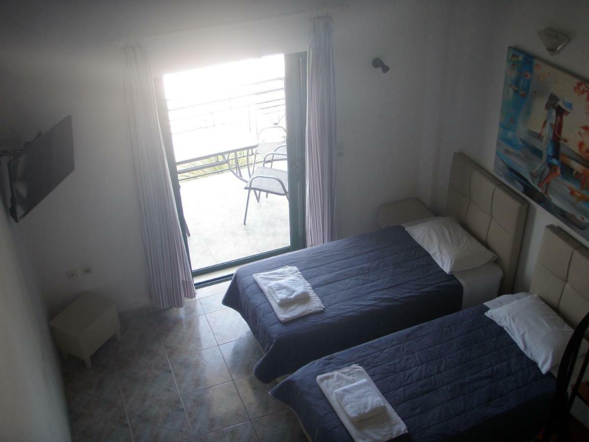 Umbrella Beach Apartments Кавос Экстерьер фото