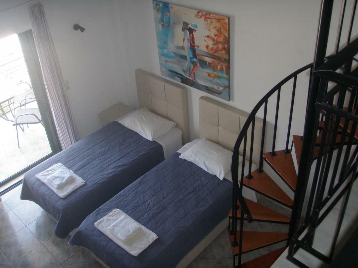 Umbrella Beach Apartments Кавос Экстерьер фото