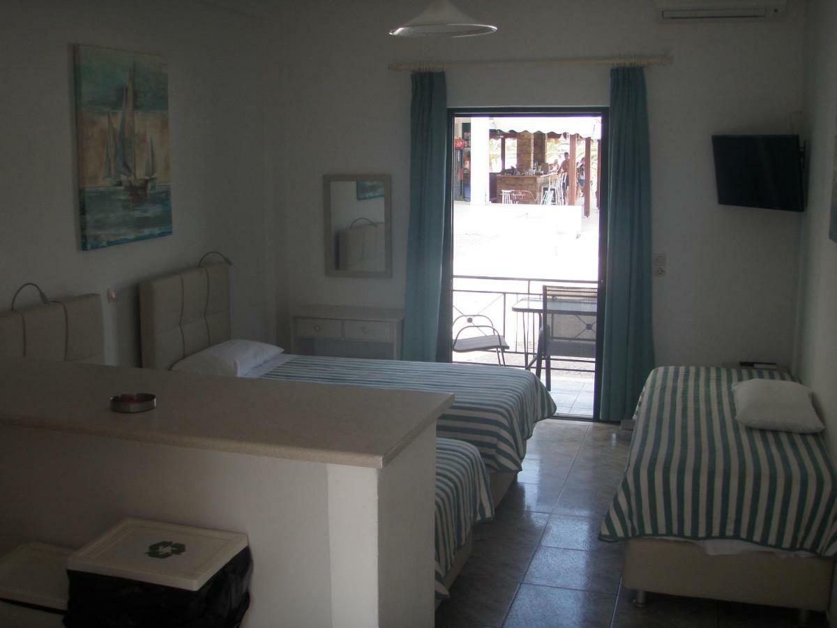 Umbrella Beach Apartments Кавос Экстерьер фото